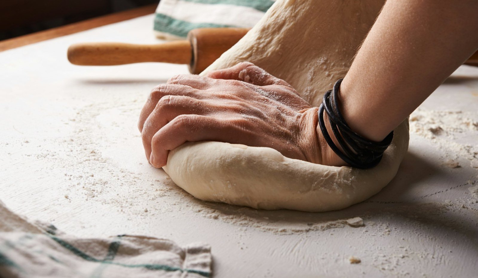 Baker kneading dough